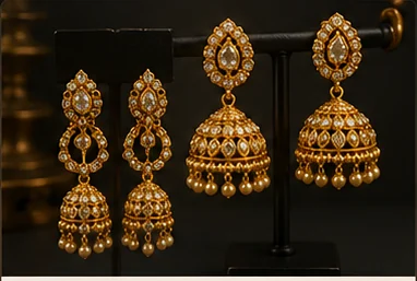 Gold earrings with detailed finishing